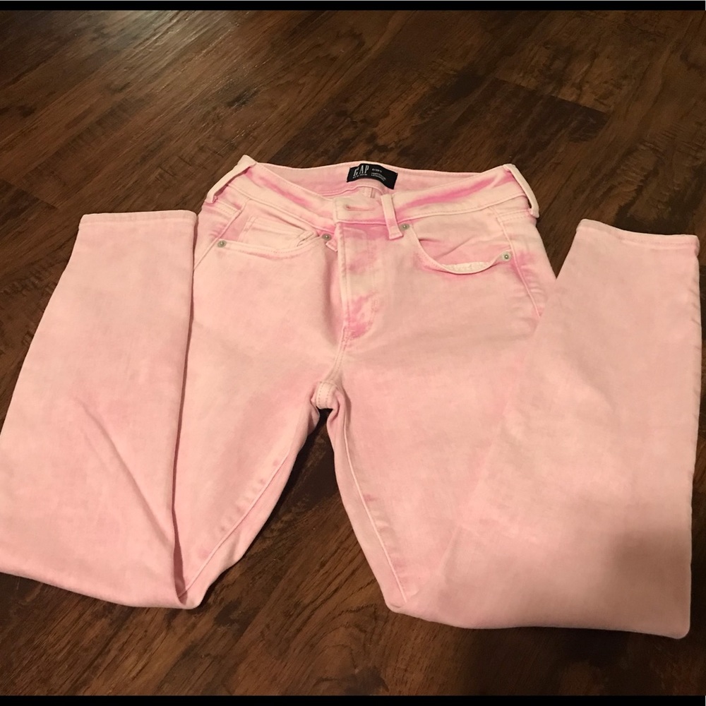 Baby pink distressed jeans